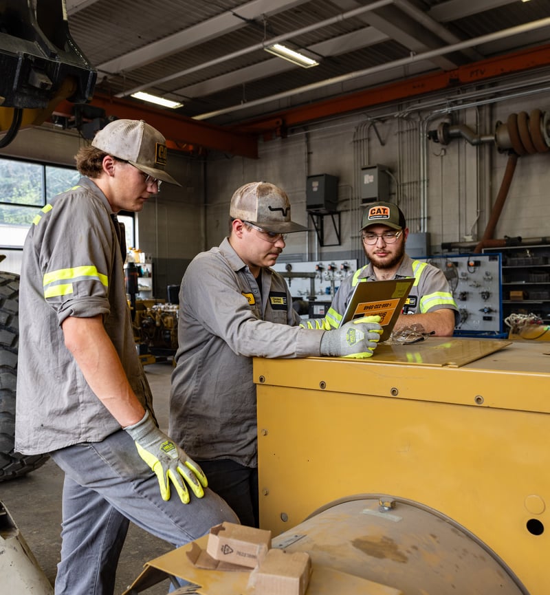 Three apprenticeship program students