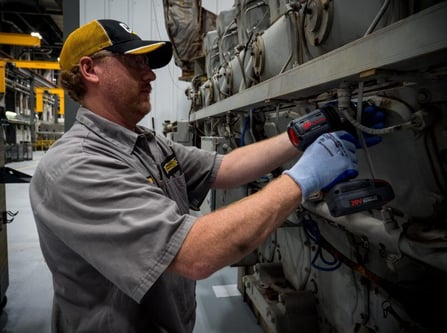 Technician Rebuilding Cat Gas Engine at Cleveland Brothers