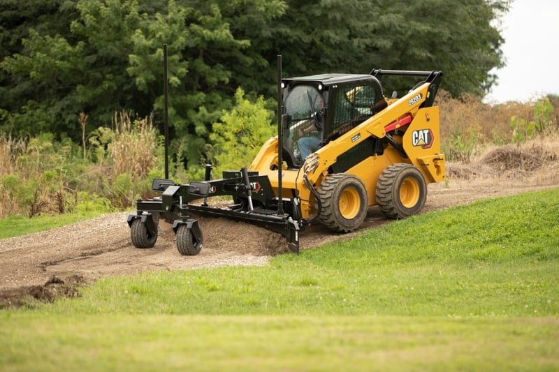 skid steer loader with grader attachment